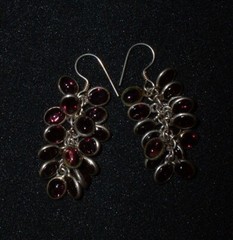 Dangling cascading earrings set with purple amethyst glass hippie