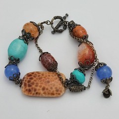 Handmade Leopard Skin Agate Turquoise Boho Bracelet with Sterling Silver Beads.