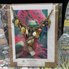 Adorned Crown Jewelry assemblage Pearl seascape bottle of sand shells necklace