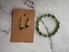 handmade beaded dangle earrings and bracelets green and gold tones