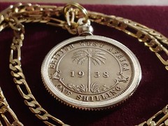 1938 British West Africa Coin Pendant on a 24″ 18KGF Gold Filled Figaro Chain