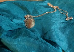 Artisan crafted,1” oval agate cab in stainless bezel, on 22” delicate silver pla