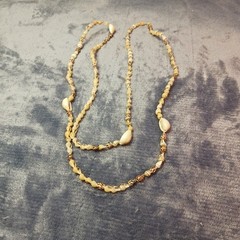 This Pretty 34″ small And Medium Size Beaded Shell Necklace Is Brown & White.