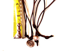 Tahitian Pearl and Black leather Two String necklace with Metal Music pendant