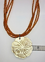 MOTHER of PEARL Hibiscus FLOWER on orange beaded NECKLACE 9.75″ total length