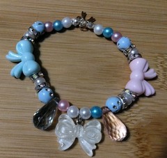 Handmade 6in Elastic Bracelet-Plastic, Polymer, Rhinestone Spacers-3 Bow Charms.