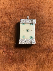 ANTIQUE HAND CARVED NEPALESE DIE PENDANT