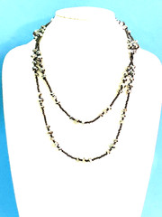Necklace 23”L. Mirror Prism Faceted 1 1/2MM Beads. & tiiny seed bead connectors