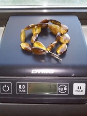 FACETED PEAR SHAPE TIGER’S EYE 17 INCH NECKLACE WITH SILVER PLATED TOGGLE CLASP
