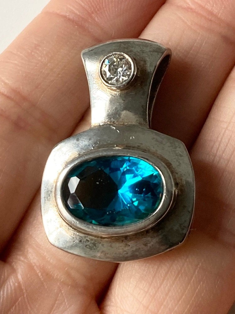 Signed SE925 sterling silver blue stone Pendant