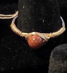 Handmade sizes 4 – 15 Wire-Wrapped Goldstone Rings with Gold-Tone Plated Wire