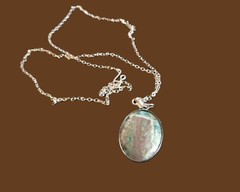 Artisan crafted,1” oval agate cab in stainless bezel, on 22” delicate silver pla