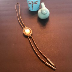 Braided faux leather lariat necklace with crafted glazed pendant preowned