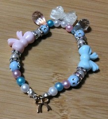Handmade 6in Elastic Bracelet-Plastic, Polymer, Rhinestone Spacers-3 Bow Charms.