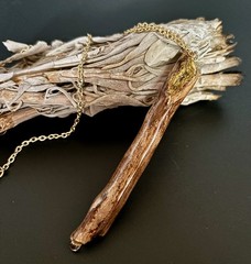 Handmade one of a kind jewelry made from real pieces of wood coated in resin