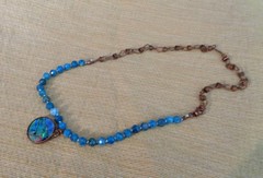 Artisan crafted,Abalone pendant on 18” faceted apatite and copper strand. Beauti