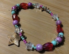 Handmade 7.25in Elastic Bracelet-Glass and Plastic, Rhinestone Spacers-2 Stars .