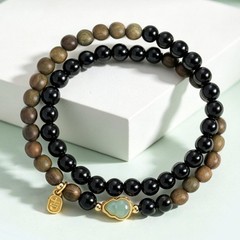 Green Sandalwood and Obsidian Women’s Buddhist Prayer Bead Bracelet