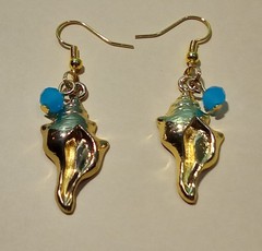 Seashell earrings with blue glass faceted bead gold metal beach summer handcraft