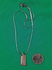 Hand Forged Copper Nickel Mokume Gane pendant on stainless chain