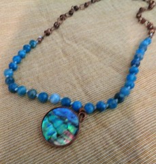 Artisan crafted,Abalone pendant on 18” faceted apatite and copper strand. Beauti