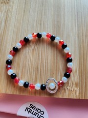 handcrafted beaded bracelet glass, plastic beads – metal caging plastic bead