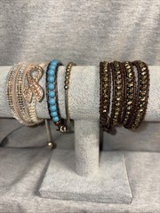 bracelets Made Of Leather And dangle charms and crystal accents