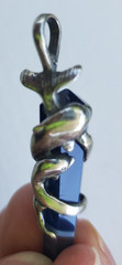 Sterling Silver Pendant of Dolphin pair clutching blue banded Agate crystal