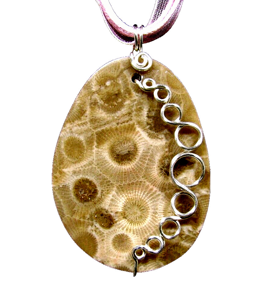 Petoskey Pendant with «bubbles» – 2″ tall by 1 1/4″ wide.