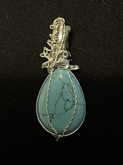 Turquoise Pendant Wrapped In Silver Copper