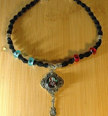 Steal Your Face Grateful Dead and Guitar on a 20″ Black Handcrafted Hemp Choker