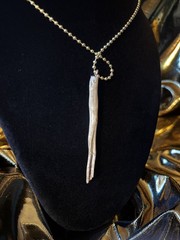 One of a kind jewelry made from real pieces of wood coated in resin