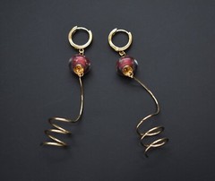 Unmatched earrings dangle, large spiral earrings gold tone