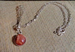 Artisan crafted,beautiful ½» sunstone cab in sterling bezel, on delicate 20” sil