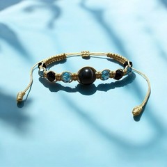 Gold cord black cats eye & blue glass beaded adjustable macrame bracelet