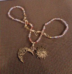 Artisan crafted,18”red rutilated quartz strand, hand knotted on silk, featuring