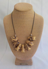 Tugna Nut Large Teardrop Bead Single Strand Necklace 18″ Long Cord Metal Hook