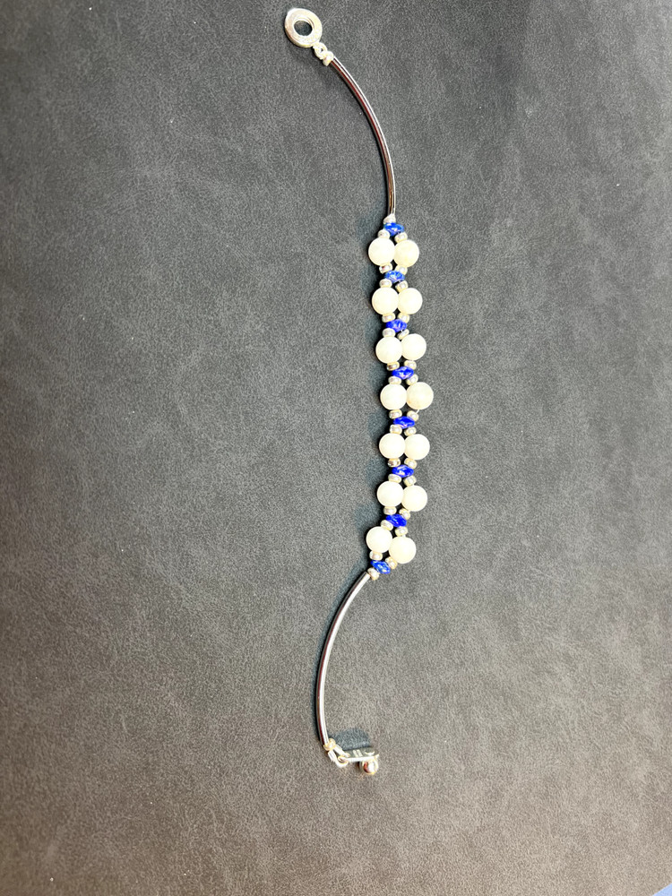 Handmade White Howlite bracelet with blue and silver accents with snap clasp