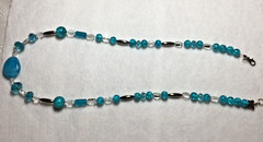 Beautiful Turquoise Necklace. 23 1/2″ long. Unique design . Makes a great gift!