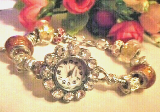 Hand assembled watch/bracelet with glass beads&silver tone charms&a watch