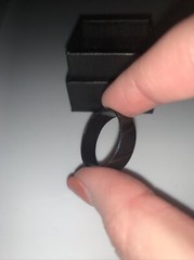 Damascus Steel Wedding Band With Carbon Fiber Inlay.