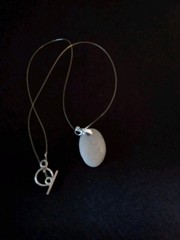 White Sea Glass w/ Silver Specks Stone on Clear Nylon Necklace w/ Silver Closure