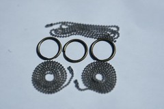 Three Bullet pendants or key rings 9mm, 223 cal and 45