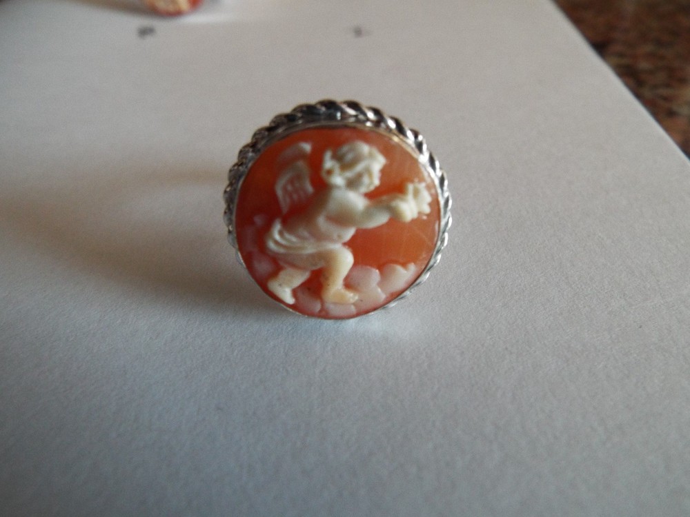 Handcarved carnelian cameo set into a Italian sterling ring adjustable to 6.0