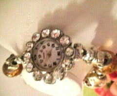 Hand assembled watch/bracelet with glass beads&silver tone charms&a watch