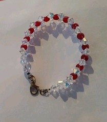 Made with Swarovski 6mm Bicone Beads AB Crystal & Lt Siam (Red) Fits7 1/2″ Wrist
