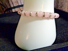 Artisan crafted 7” bracelet of rose quartz, silver plated rhinestone spacers and