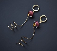 Unmatched earrings dangle, large spiral earrings gold tone