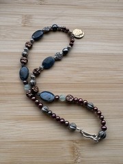 Handcrafted Multicolor Beaded Necklace with Moon Face Pendant and Kyanite Beads