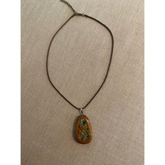 Abalone inlaid in polished wood pendant on cord